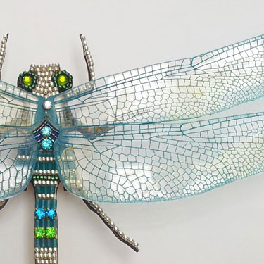 Dragonfly mosaic in frame